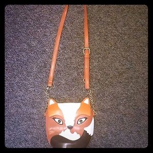 Leather crossbody fox purse.
